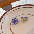 Purple Six Petal Clear Accent Flower Stud Earrings view 4