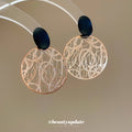 Gold Tone Openwork Disc Earrings With Black Oval Studs view 2
