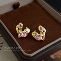 Gold Liquid Heart Openwork Pink Zircon Stud Earrings view 1