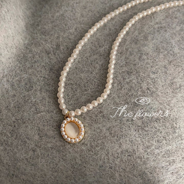 White Pearl Strand Gold Tone Oval Halo Pendant Necklace