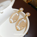 White Oval Leaf and Pearl Drop Earrings in Gold Tone view 4