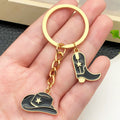 Black Western Hat and Boot Star Metal Keychain Set view 3