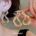 Sculpted Twisted Oval Stud Earrings in Gold and Silver Tone view 1
