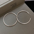 Slim Silver Round Hoop Earrings in Four Sizes with Polished Metal Details view 6