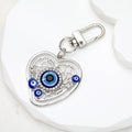 Gold and Silver Tone Heart Evil Eye Clip Keychains view 3