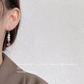 Gold Tone Pearl And Pink Chip Asymmetric Hook Earrings view 2