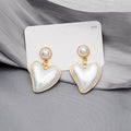 White Pearl Look Double Heart Bold Dangle Stud Earrings view 1