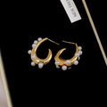 Gold Tone Chunky Hoop Earrings With White Pearl Border Accents view 6
