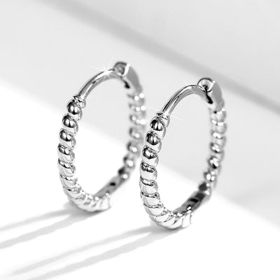 Product view 1 showing small hoops with twisted rope texture