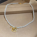 Pearl Necklace Bracelet Earrings Gold Rocking Horse Charms view 6