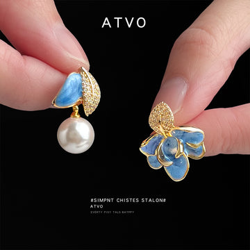 Gold Tone Blue Flower And White Pearl Asymmetric Stud Earrings