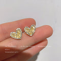 Gold Tone Fully Set Clear Stone Heart Stud Earrings For Women view 4