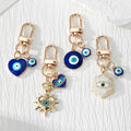 Blue Evil Eye Heart, Sun and Hexagon Lobster-Clasp Charms view 1