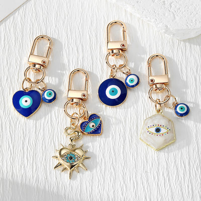 Main product view of blue Evil Eye Heart, Sun and Hexagon Lobster-Clasp Charms