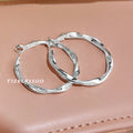 Irregular Twisted Large Hoop Earrings In Gold And Silver Tone view 4