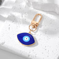 Gold and Silver Tone Deep Blue Evil Eye Clip Keychains view 8