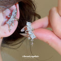 Crystal Star Dangle Single Ear Clips with Polished Metal Tone Details view 3