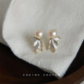 Gold Tone White Pearl Top And Sculpted Leaf Drop Stud Earrings view 4