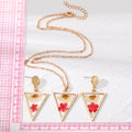 Gold Tone Triangle Daisy and Red Pressed Flower Necklace and Earrings view 4