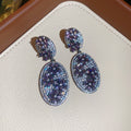 Pair of Metal Tone Purple and Green Crystal Oval Drop Earrings view 6