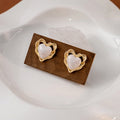 Gold Twist Frame Heart Stud Earrings Marbled Enamel Centers view 4