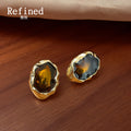 Gold Irregular Frame Amber Glass Cabochon Stud Earrings view 1