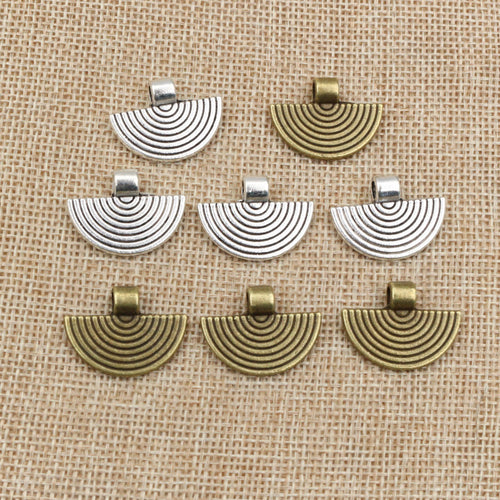Ridged fan pendants arranged to show surface details