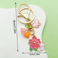 Flower Charm Keychains Featuring Pink Butterfly Across 10 Pictured Variations view 6