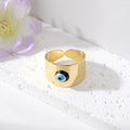 Gold Tone Wide Cuff Evil Eye Adjustable Rings in Eight Colors view 10