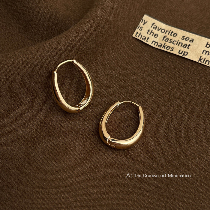 Gold Polished Oval Hinged Hoop Earrings Thick Front