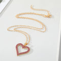 Gold Tone Bright Red Crystal Open Heart Pendant Necklace view 2