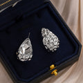 Silver Textured Teardrop Stud Earrings Hollow Hammered view 3