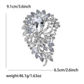 Oval Gem Feather Brooch In Eight Colorways With Polished Metal Detail view 6