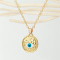 Gold Tone Round Textured Evil Eye Medallion Pendant Necklace view 1