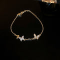 Gold Tone Butterfly Bracelet With Clear Crystal And White Shell Like Wings view 6