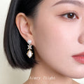 Gold Pearl Drop Earrings Oval Cat Eye Stone Crystal Flower view 2