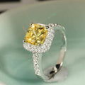Yellow Cushion Solitaire Halo Ring In Polished Silver Tone view 1
