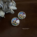 Gold Tone Blue Round Floral Scene And White Flower Stud Earrings view 3