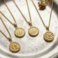 Wing and Floral Round Medallion Necklaces in Gold Tone view 2