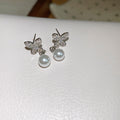 Butterfly and Pearl Drop Stud Earrings in Gold and Silver view 7