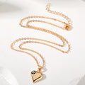 Gold Tone Puffy Heart Pendant Necklaces with Evil Eye Accents view 4