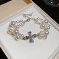Silver Rhinestone Cross Pearl Bracelet Matching Cross Necklace view 6