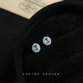 Silver Tone Pale Blue Oval Stone And Clear Floral Halo Stud Earrings view 3