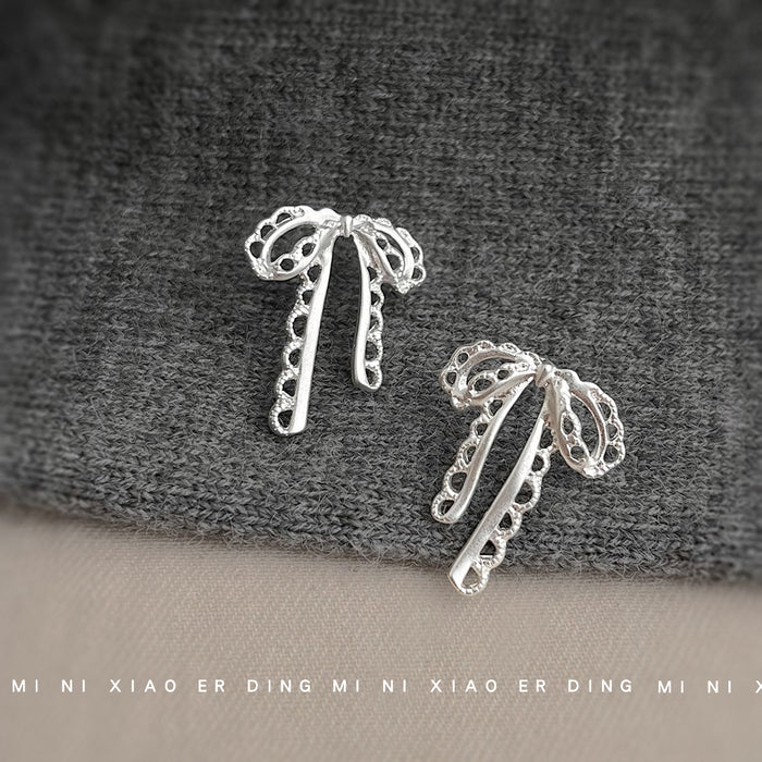 Matte Silver Lace Edge Bow Stud Earrings Openwork Metal