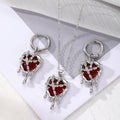 Silver Tone Melting Heart Necklace and Huggie Earring Options view 3