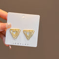 Twenty-Seven Mixed Gold Tone Stud Hoop and Dangle Earrings view 4