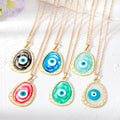 Gold Tone Oval Resin Evil Eye Pendant Necklaces in Six Colors view 1