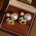 Asymmetric Gold Tone Rocking Horse And Pearl Stud Earrings view 3