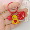 Yellow Heart Duck Keychain with Red Lips and Bell Charms view 2