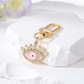 Gold Tone Crystal Lash Enamel Evil Eye Clip Keychains in Five Colors view 3